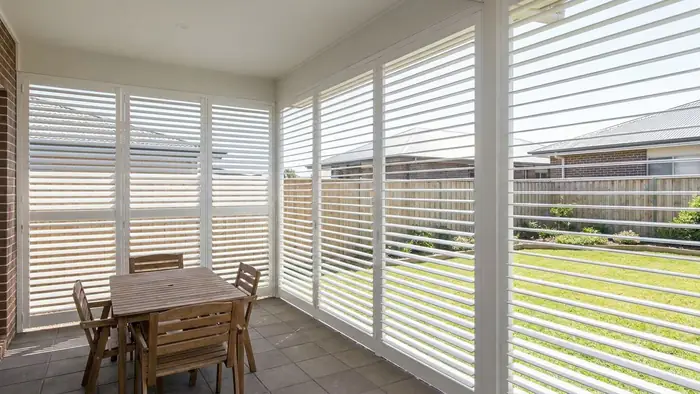 Aluminium shutters on an alfresco