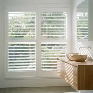 Waterproof PVC internal shutters in a bathroom